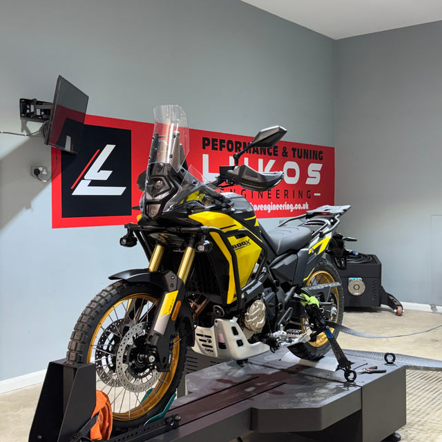 2025 Voge DS800X on a dyno stand with a lukos engineering branded banner in the background