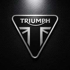 Triumph logo on a dark carbon fiber background